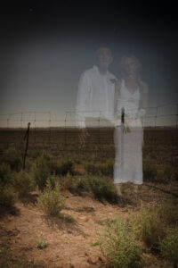 An ethereal image of a bride and groom with an Australian paddock in the background and the night sky.